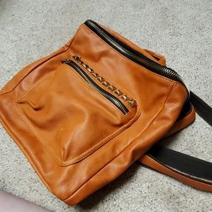 Burnt orange leather studded backpack